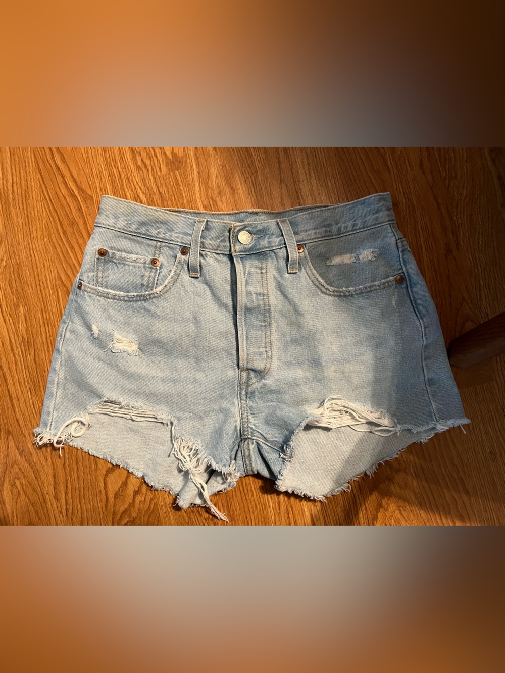 Levi’s High-Rise Distressed Light Blue Denim Shorts - Women